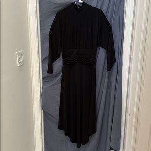 BCBGMaxAzria Black Dress, high neck, shoulder pads and zipper back. Size M